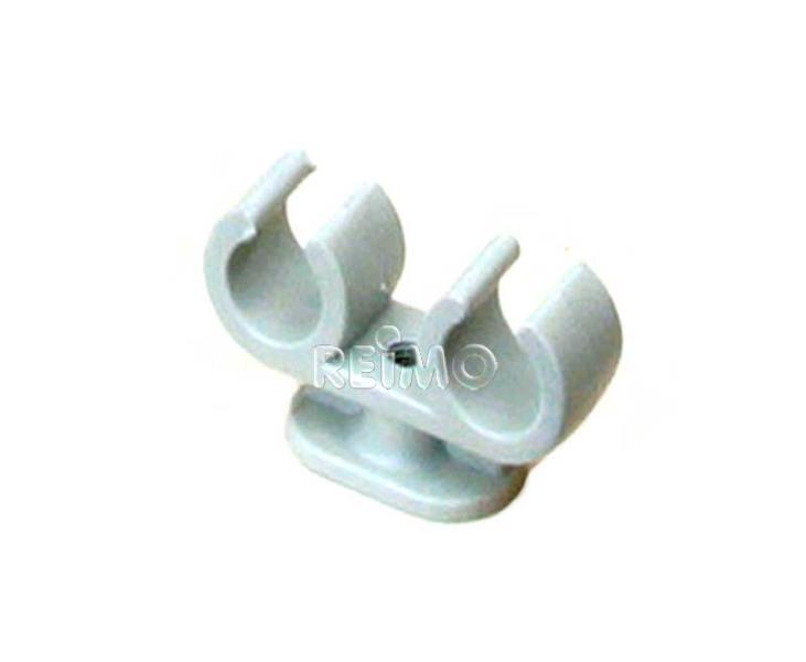 Uvoľnená dvojitá potrubná svorka